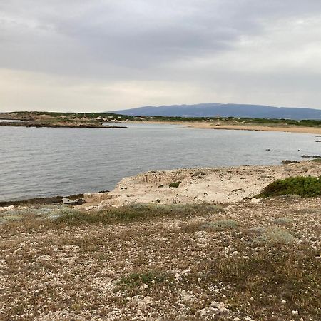Апартаменты Fronte Mare S'Arena Scoada Путзу-Иду Экстерьер фото